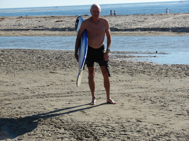 Randy Norquist coming in from surfing looking awesome.